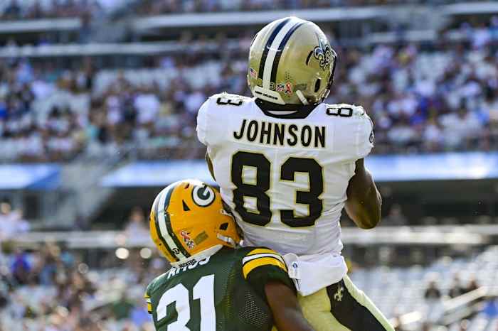 New Orleans Saints tight end Juwan Johnson (83) catches a touchdown Green Bay safety Adrian Amos (31). Mandatory Credit: Tommy Gilligan-USA TODAY Sports